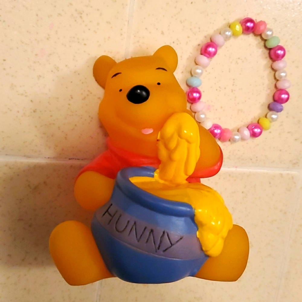 Winnie The Pooh squeeze toy & bracelet